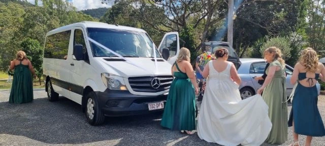 Group enjoying luxury chauffeur car ride in Brisbane