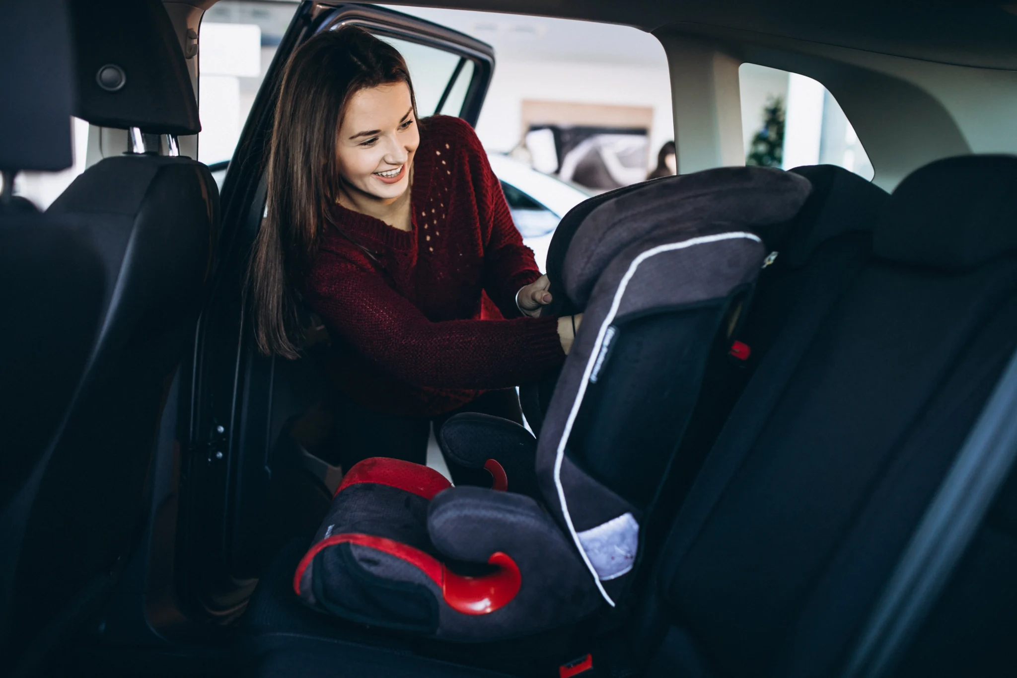 Luxury car with professionally fitted baby car seat for safe travel in Brisbane and Gold Coast