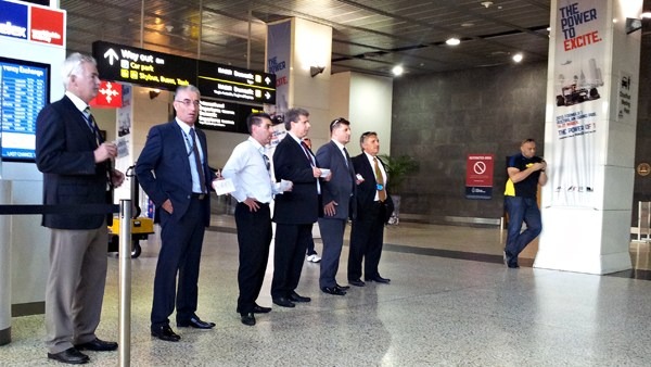 Airport chauffeur transfer arriving at major Australian airport terminal